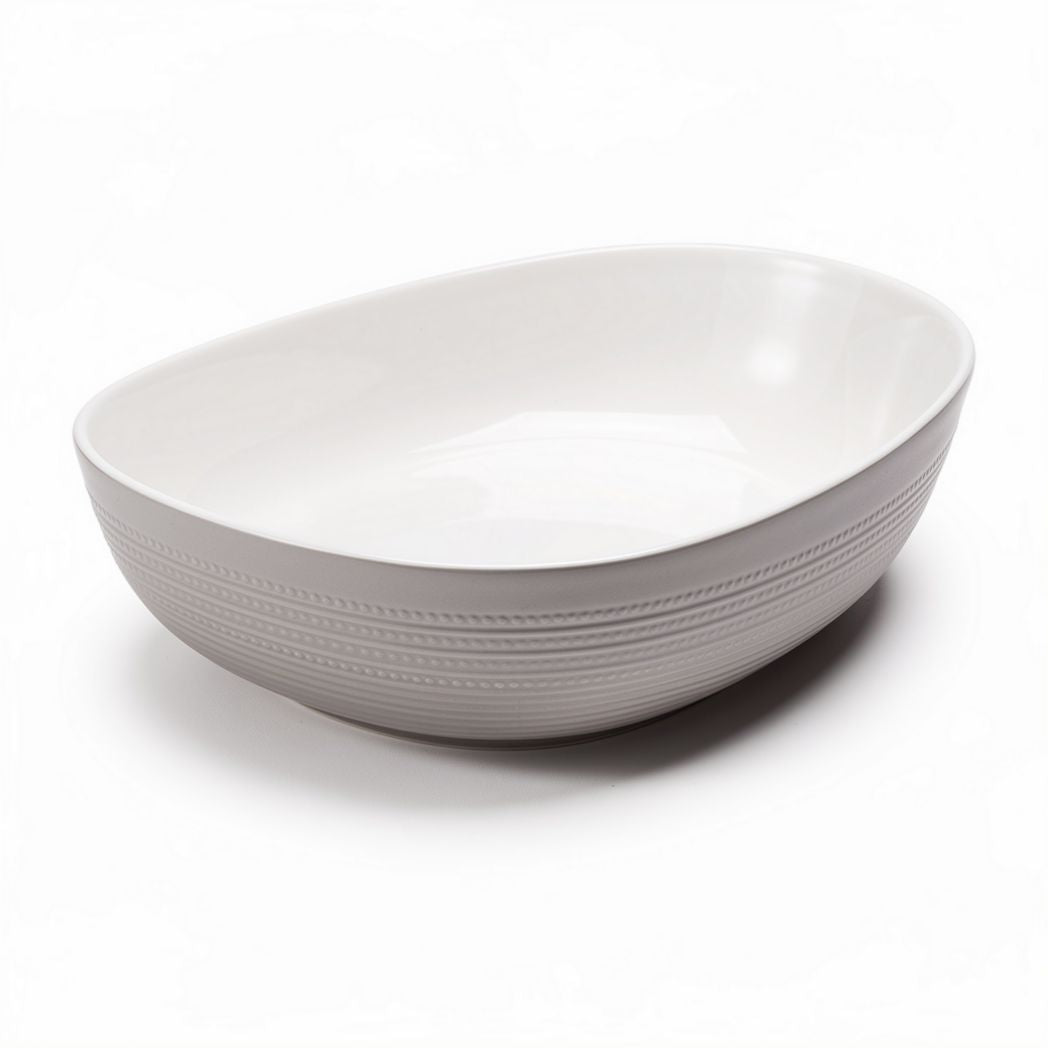 Tigela oval em cerâmica branca com dimensões de 25 x 20 x 7cm